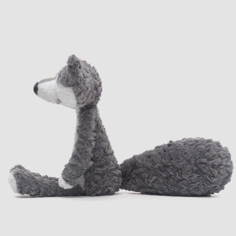 Grey wolf plush side view – realistic soft plush fur and detailed facial features